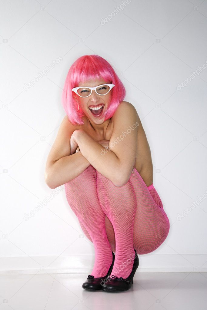 Woman in pink wig.