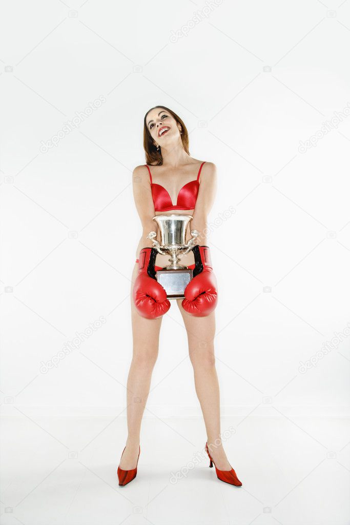 Woman and boxing trophy.