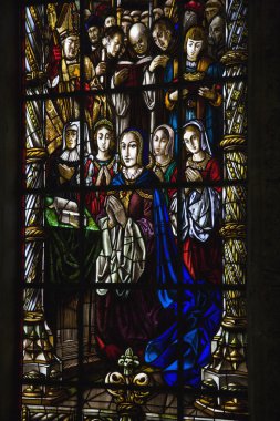 Stained glass window in Jeronimos Monastery in Lisbon, Portugal. clipart