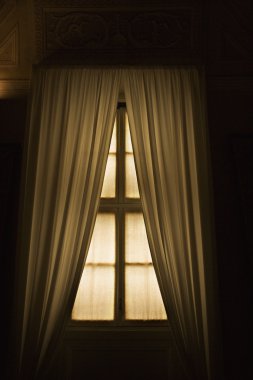 Interior window with drapes. clipart