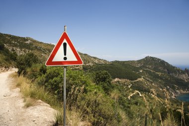 Dangerous dirt road. clipart