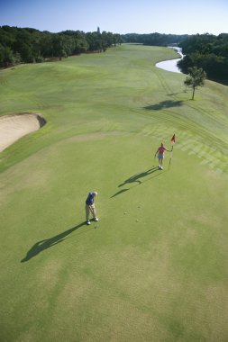 Aerial of golfers. clipart