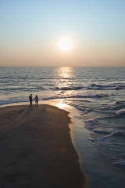 Couple on beach. clipart