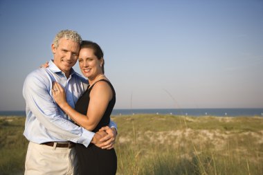 Portrait of Couple on Beach clipart