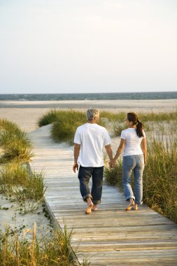 Couple at beach. clipart