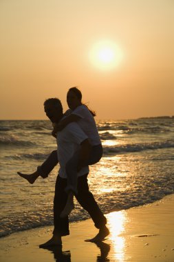 Couple at beach. clipart