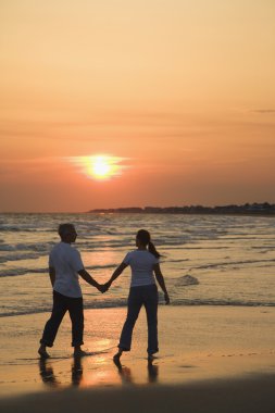 Couple on beach. clipart