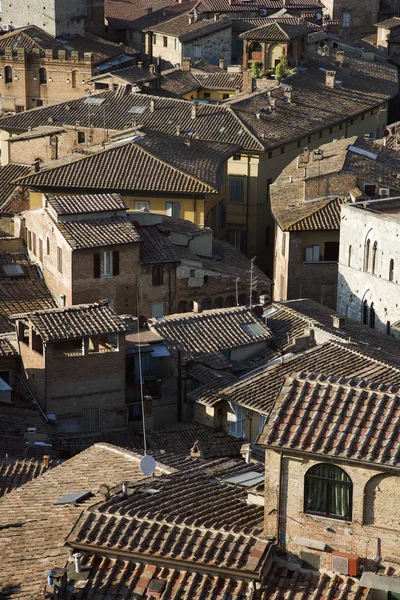 Siena, Italien hustaken. — Stockfoto