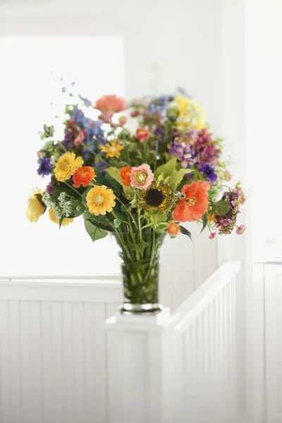 Colorful flowers arranged in vase. — Stock Photo, Image