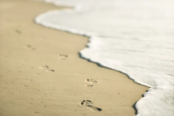 Footprints on beach. — Stock Photo, Image