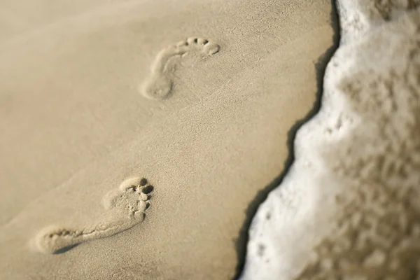 Fotspår i sand. — Stockfoto