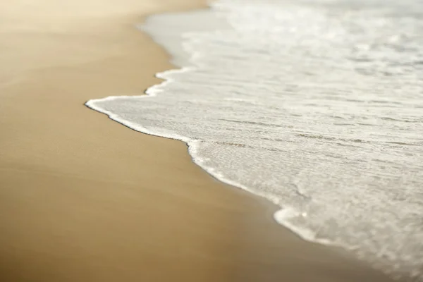 Sand med vågor. — Stockfoto
