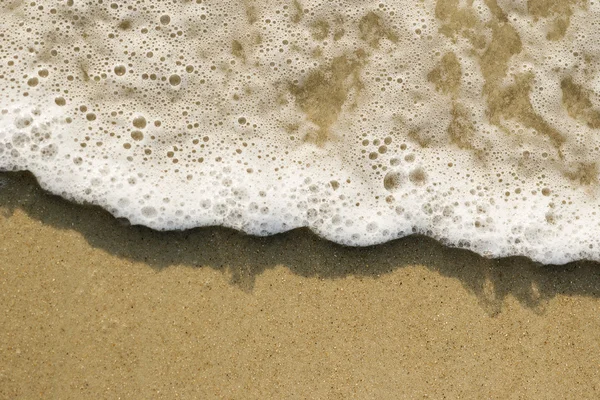 Sanden och vågorna. — Stockfoto