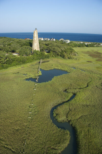 Lighthouse in marsh.