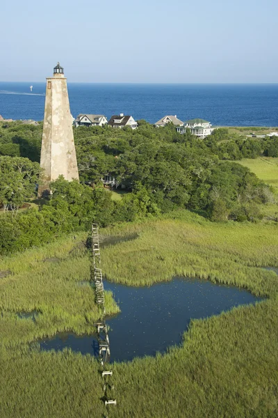 Lighthouse in marsh. — Stock Photo, Image