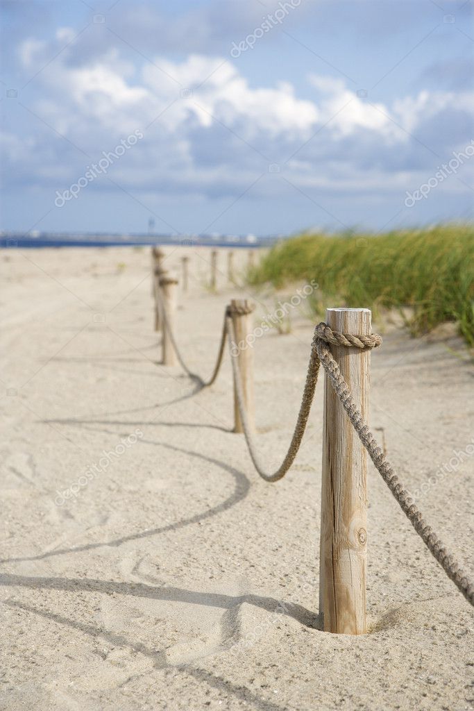 Rope fence on beach. — Stock Photo © iofoto #9498608