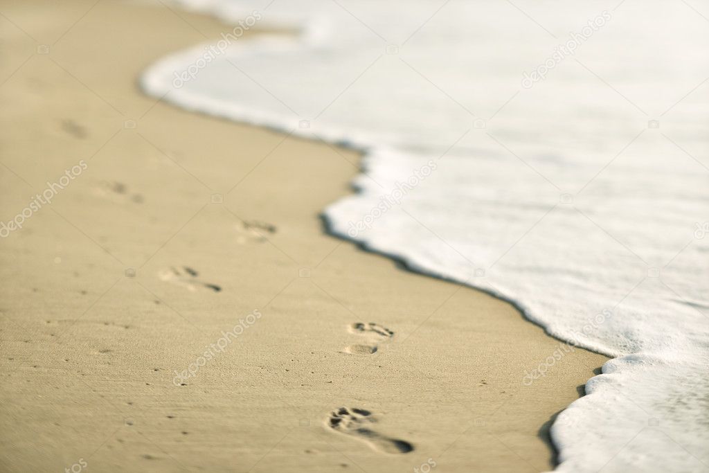 Footprints on beach.