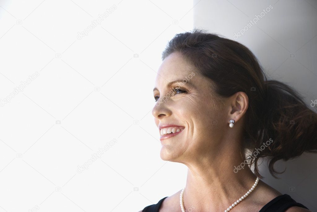 Portrait of smiling woman.