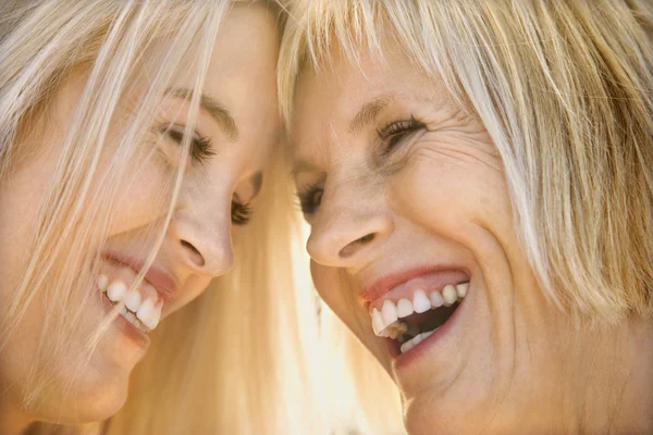 Mom and daughter laughing. — Stock Photo, Image