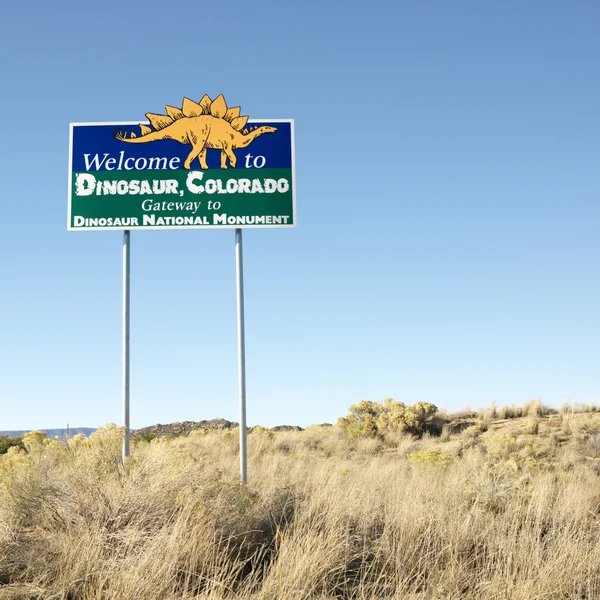 Señal de bienvenida Dinosaurio, Colorado . —  Fotos de Stock