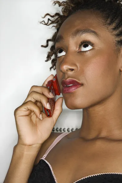 Young woman on cellphone. Royalty Free Stock Photos