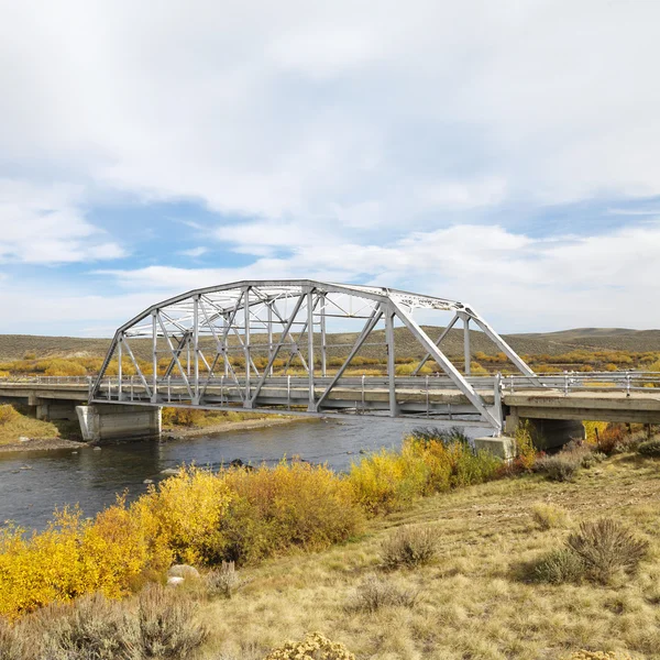 Bridge over stream in Wyoming. — Stock Photo, Image