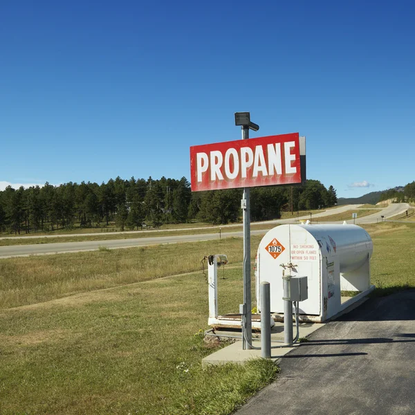 Propane tank on side of road. — Stock Photo, Image