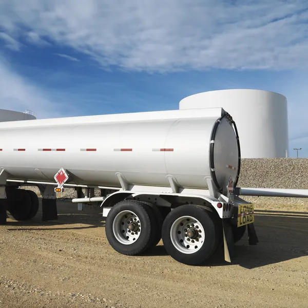 Fuel tanker and fuel farm. — Stock Photo, Image