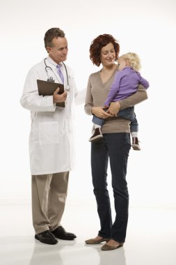 Pediatrician and patient. clipart