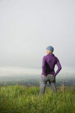 Woman in field. clipart