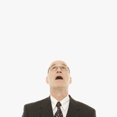 Businessman looking up. clipart