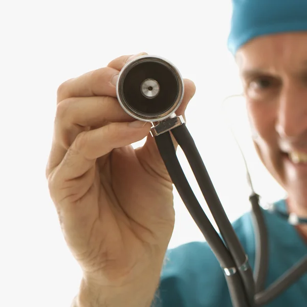 Doctor holding stethoscope. — Stock Photo, Image