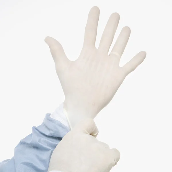 Läkaren handskar. — Stockfoto