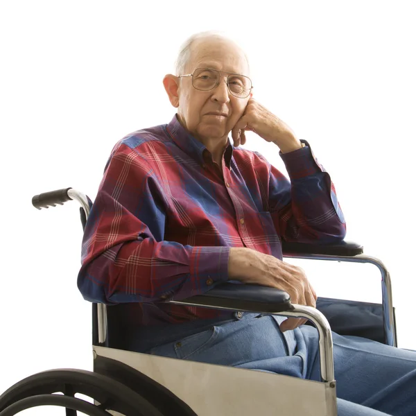 Tekerlekli sandalyedeki yaşlı adam. — Stok fotoğraf