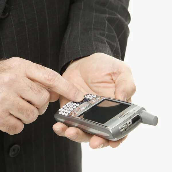 Homme d'affaires utilisant PDA . — Photo