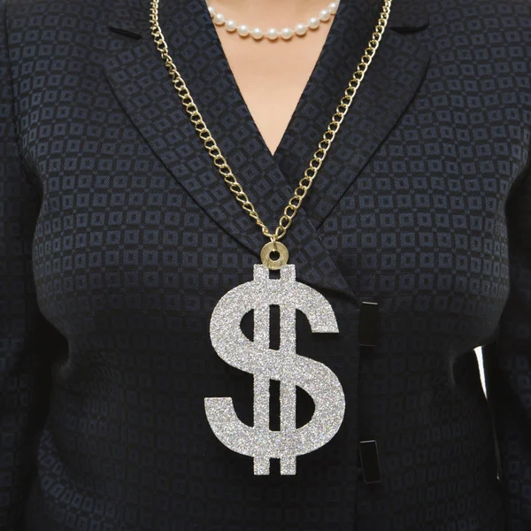 Woman wearing dollar sign. — Stock Photo, Image