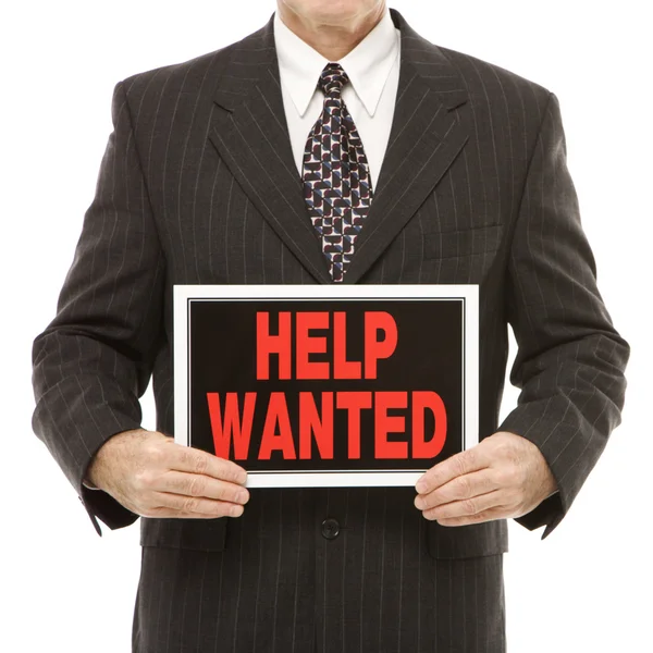 Man with help wanted sign. — Stock Photo, Image