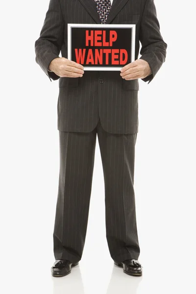 Man with help wanted sign. — Stock Photo, Image