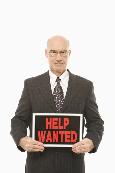 Man with help wanted sign. — Stok Foto