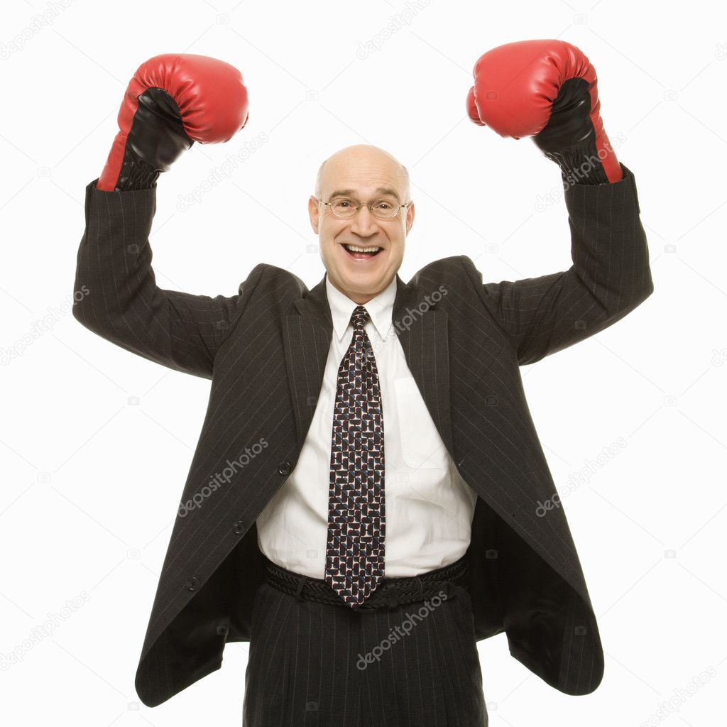 Businessman boxing gloves.