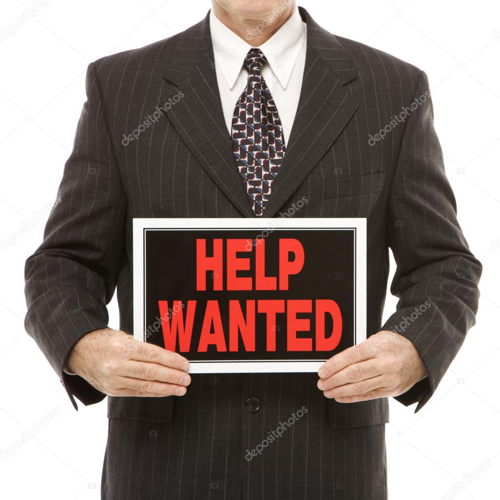 Man with help wanted sign.