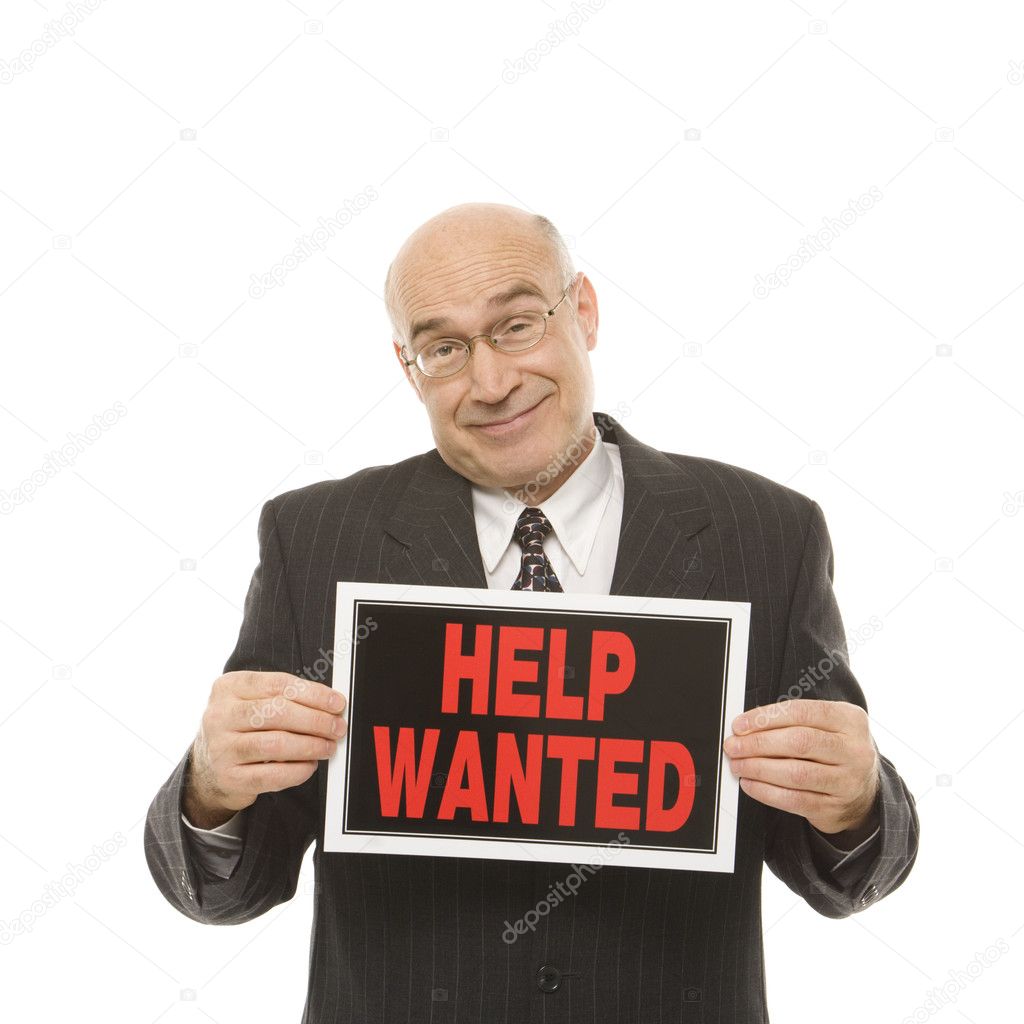 Man with help wanted sign.