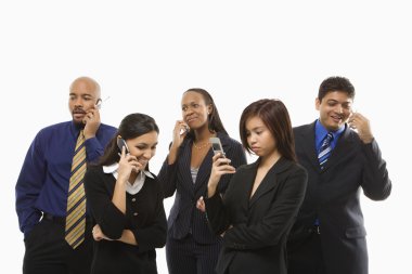 Businesspeople on cellphones. clipart