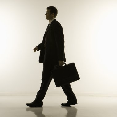 Businessman walking. clipart