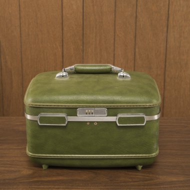 Vintage green luggage. clipart