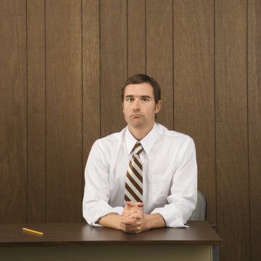 Man at desk. clipart