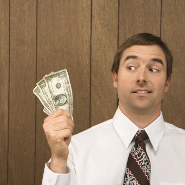 Man holding money. clipart