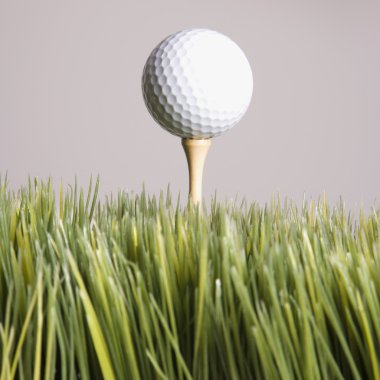 Teed up golf ball. clipart