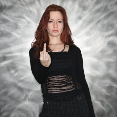 Woman giving middle finger. clipart