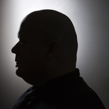Silhouette of bald man. clipart